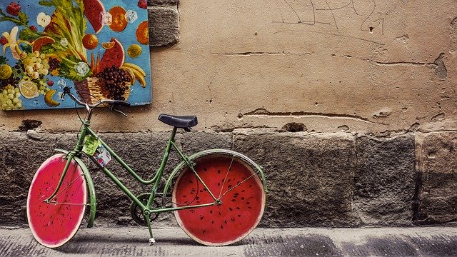 a bicycle with watermelon wheel