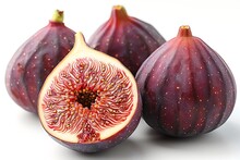 a group of figs with one cut in half