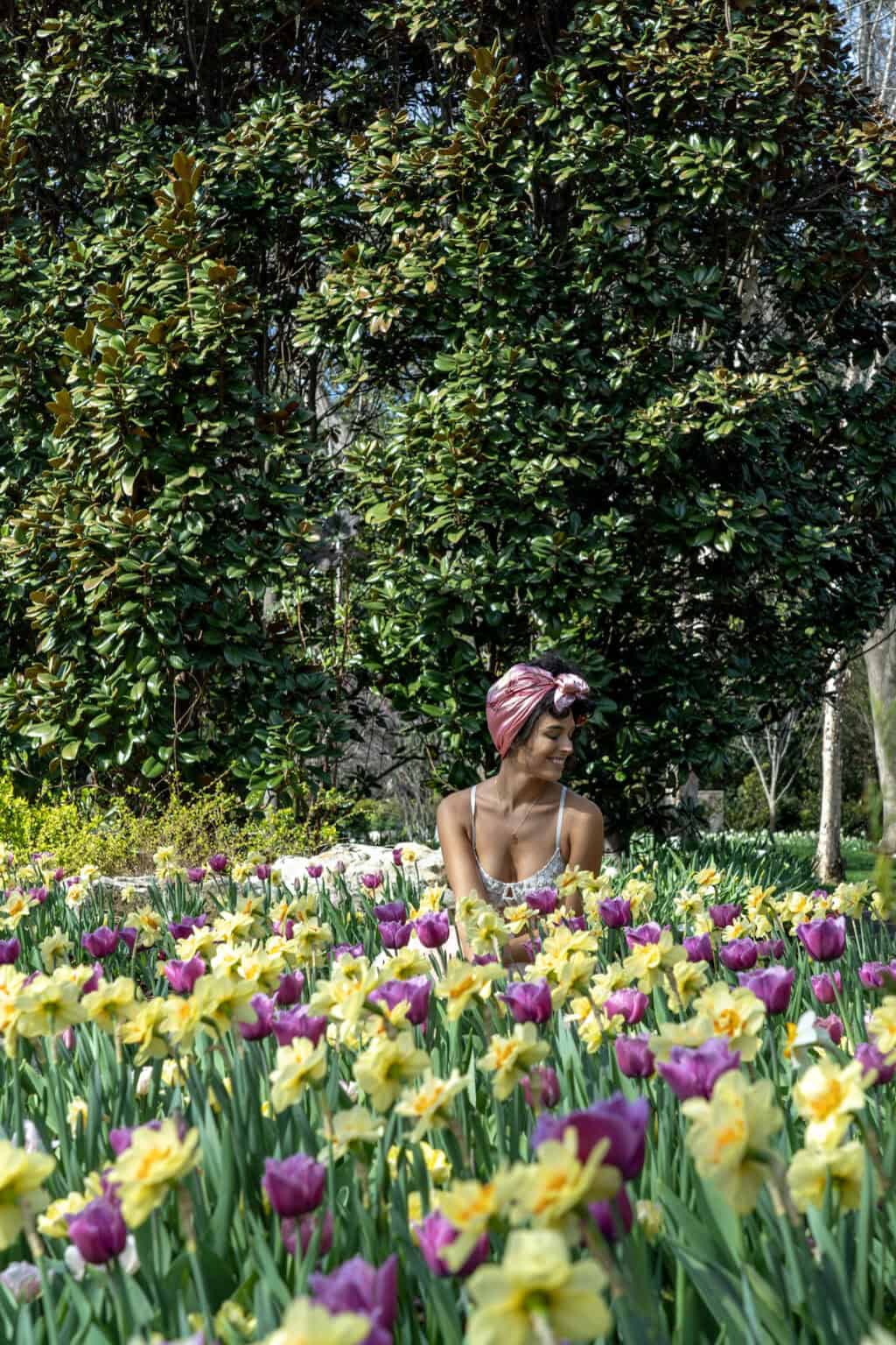 a woman in a flower field