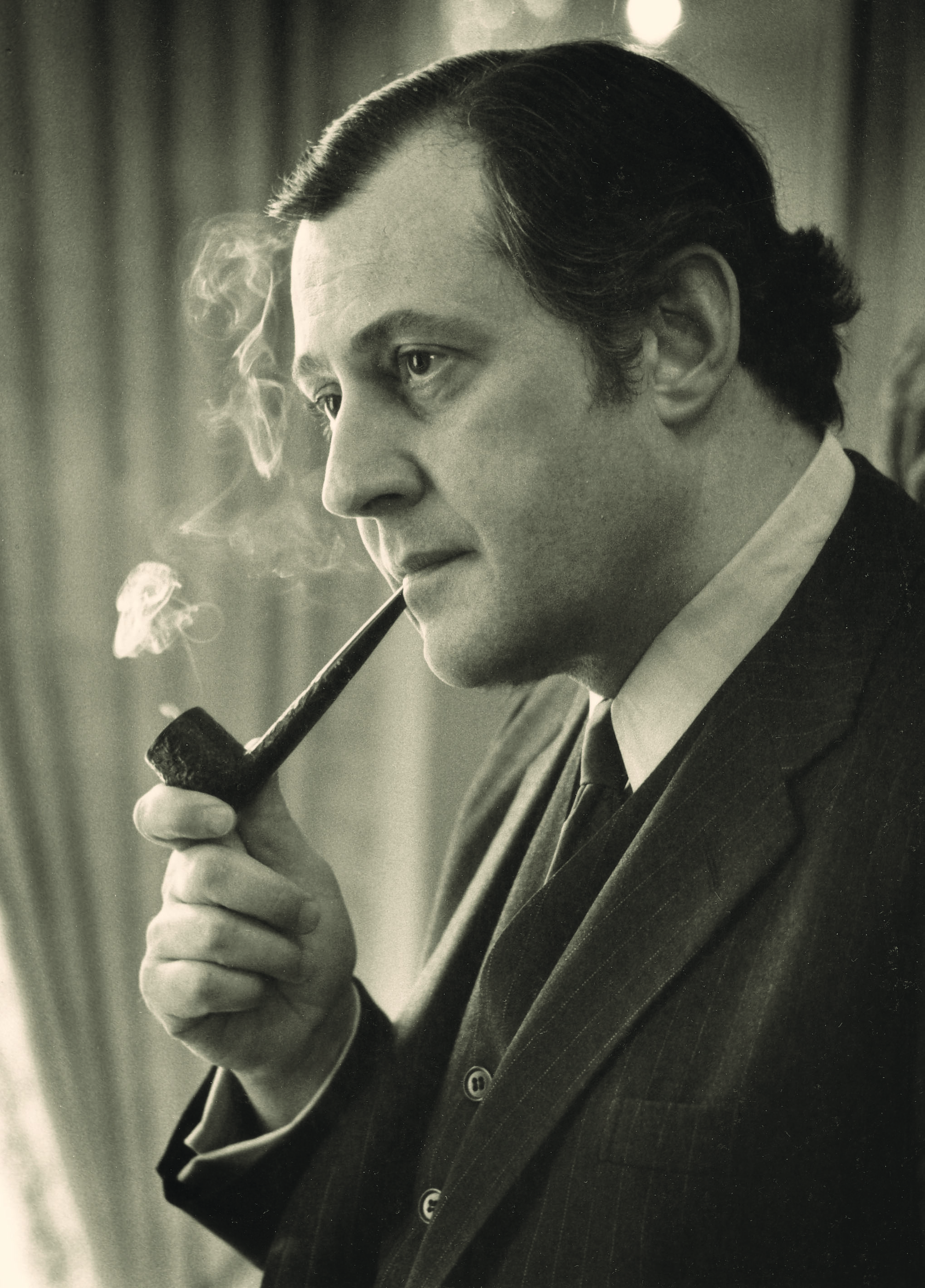 a man smoking a pipe