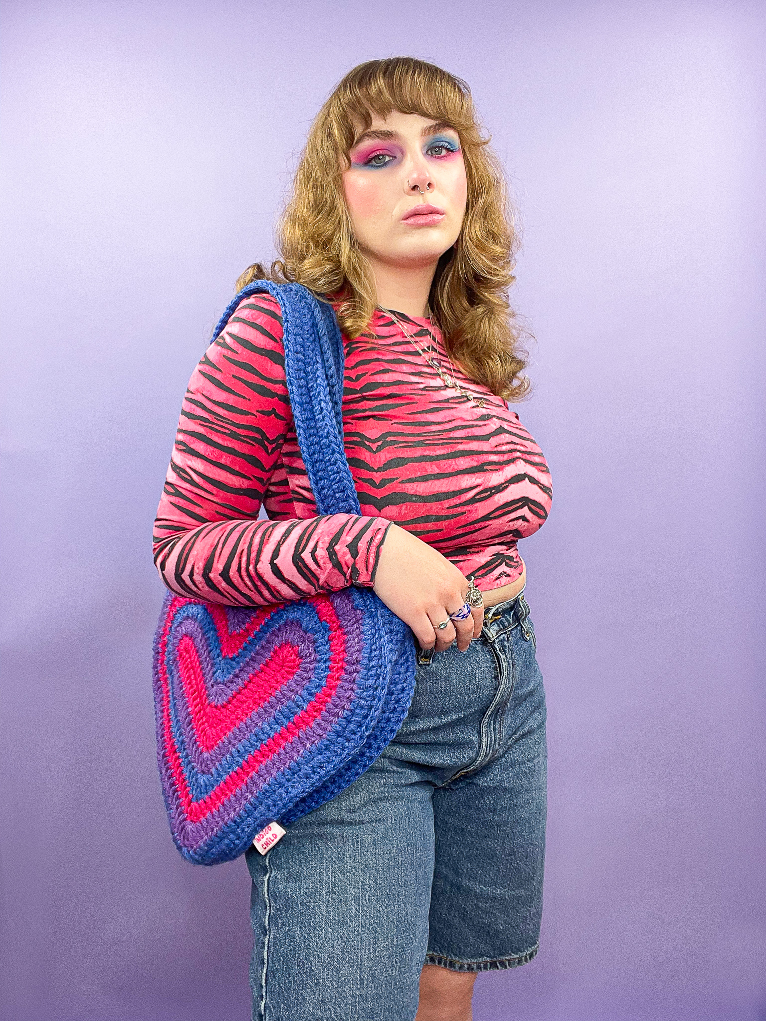 a woman with a knit bag