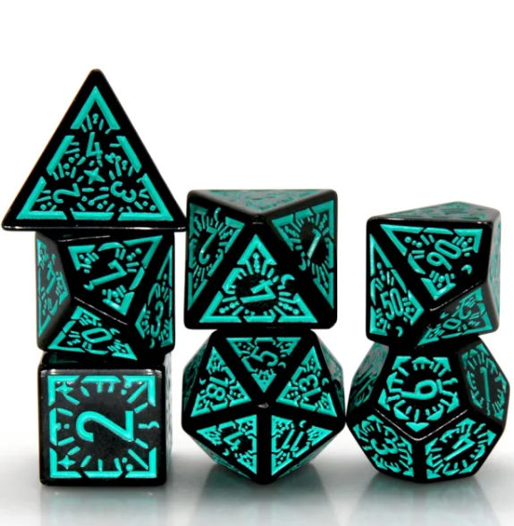 a group of black and green dice