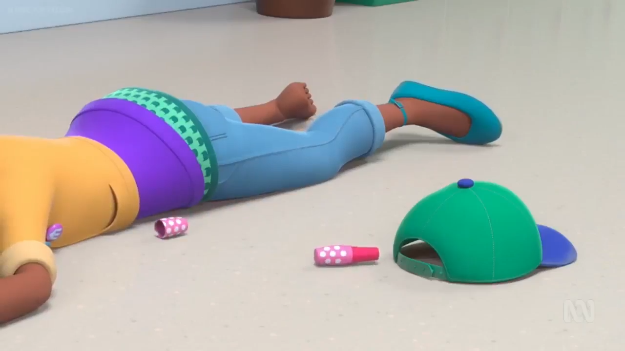 a doll lying on the floor
