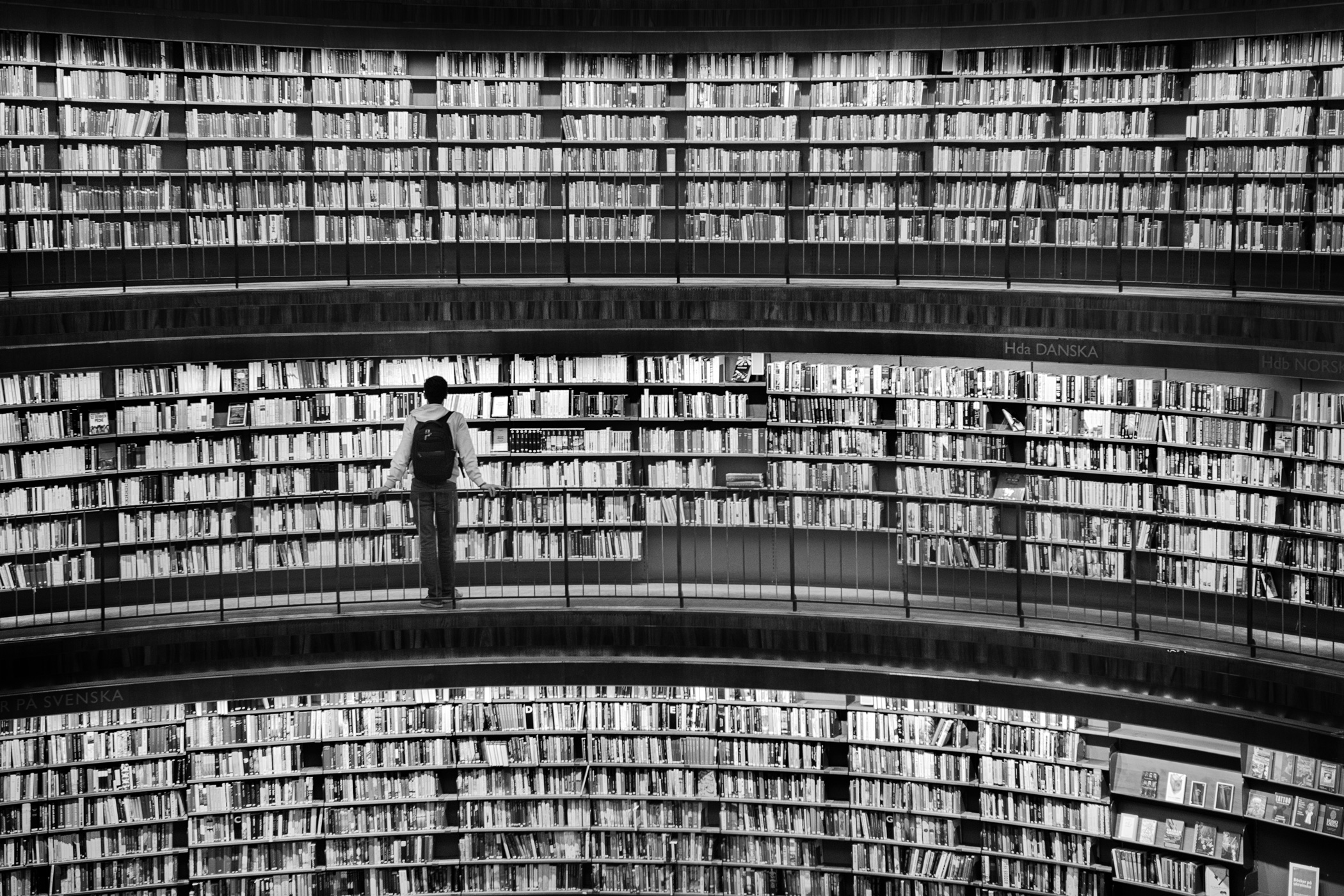 a man standing in a library