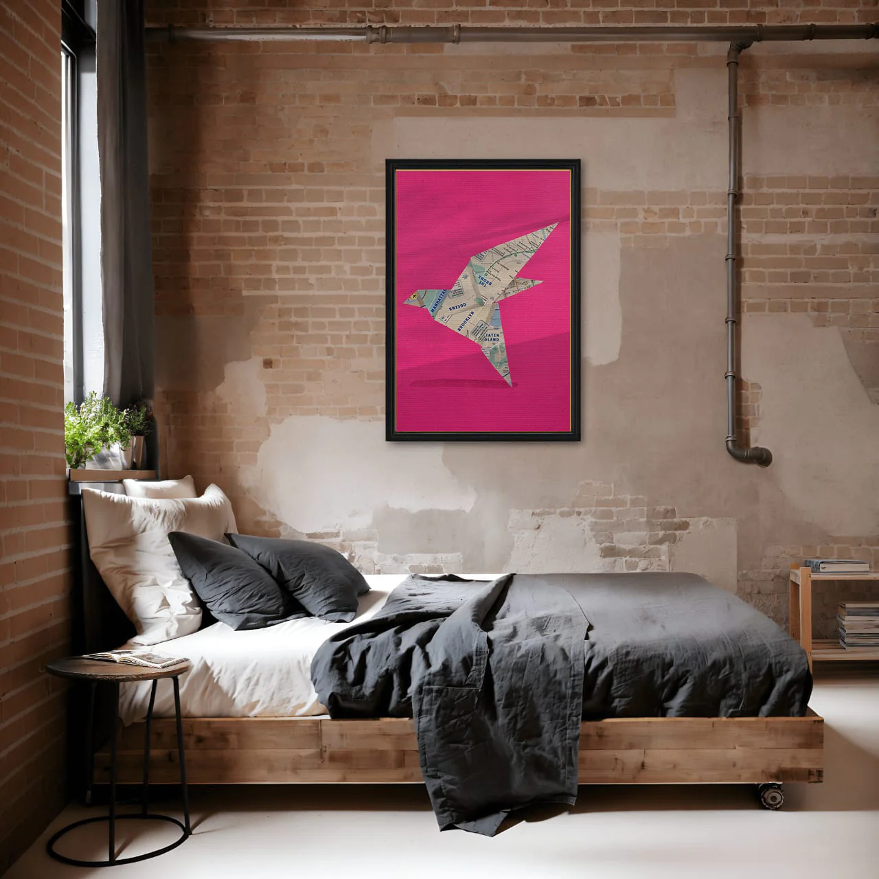 a bed in a room with a pink framed picture